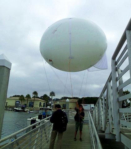 Walking the balloon to the boat