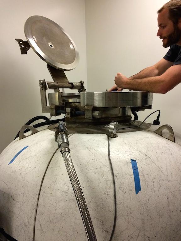 Josiah loading our camera enclosures into the pressure tank